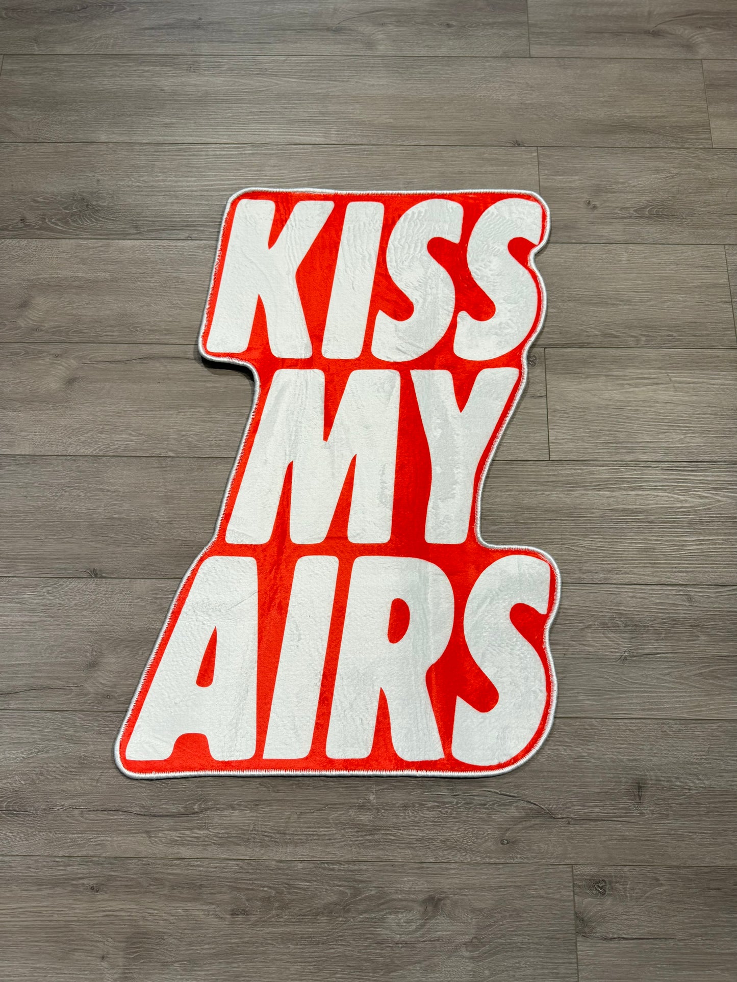 Custom “KISS MY AIRS” Rug